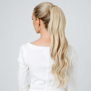 Long wand wave ponytail back view on blonde hair