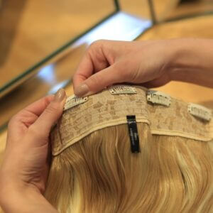 Clips on a one piece clip in hair extension